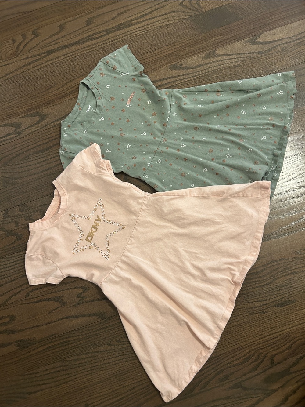 2 Girls DKNY Dresses. 1. Pink Star Tee Dress & 1. Sage Star Print Dress